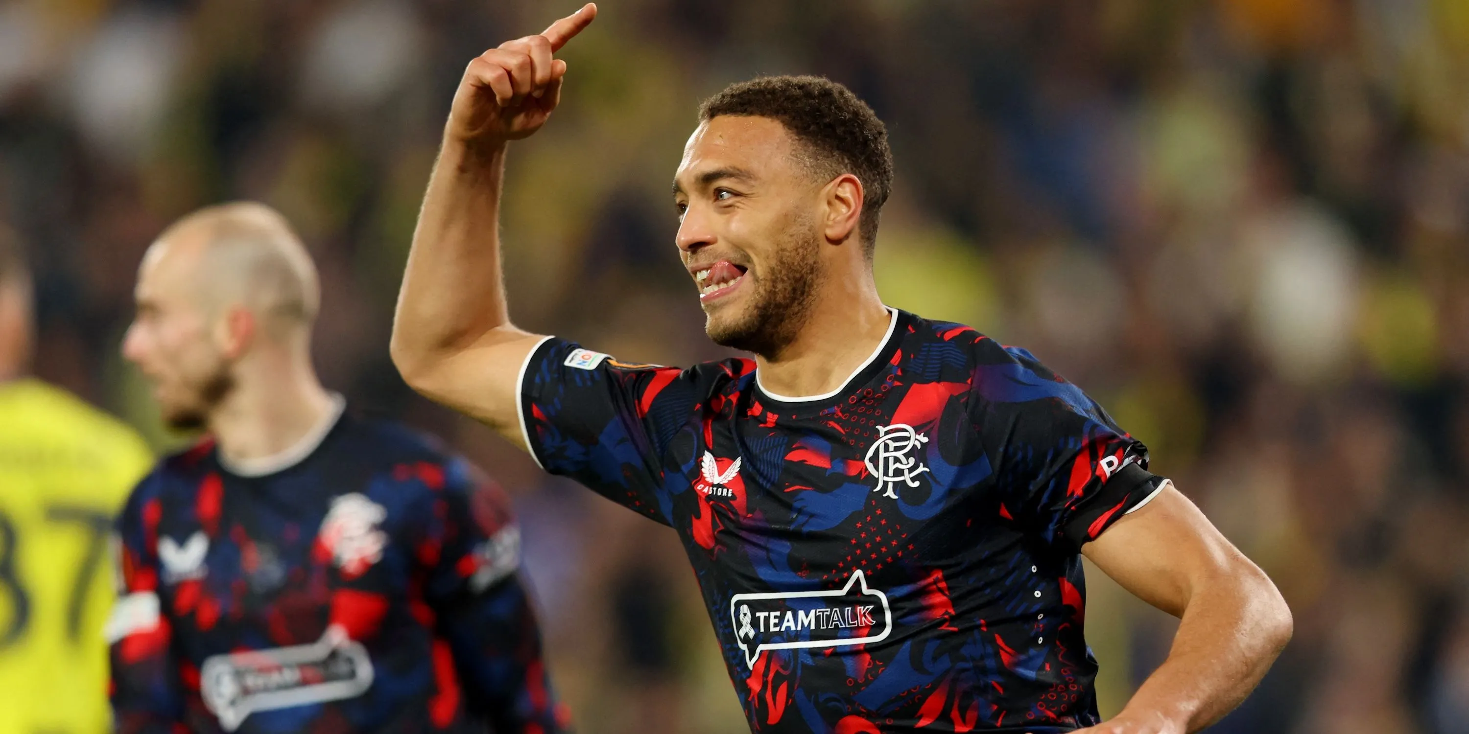 Tiền đạo Cyriel Dessers ăn mừng một bàn thắng sau đó bị từ chối của Rangers.